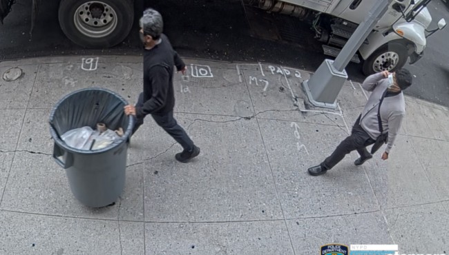 Watch: Brazen burglar strolls down NYC street with jewelry
stuffed in trash can