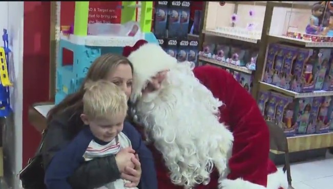 Children of fallen FDNY firefighters go on holiday shopping
spree