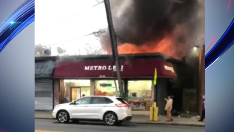 Fire rips through Queens deli, FDNY says